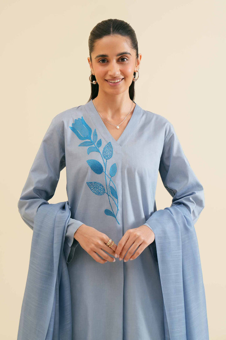 Blue 2 piece suit with embroidered leaf designs