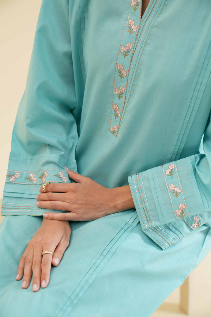 Stylish turquoise 2 piece embroidered solid suit 