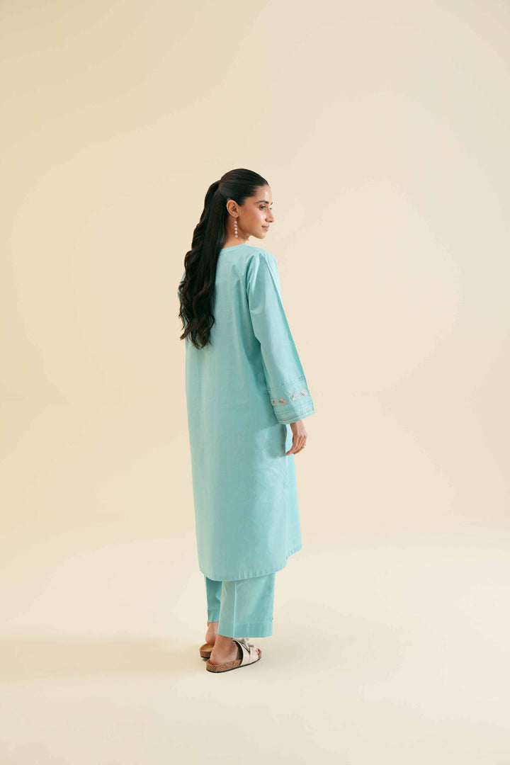 Stylish turquoise 2 piece embroidered solid suit 