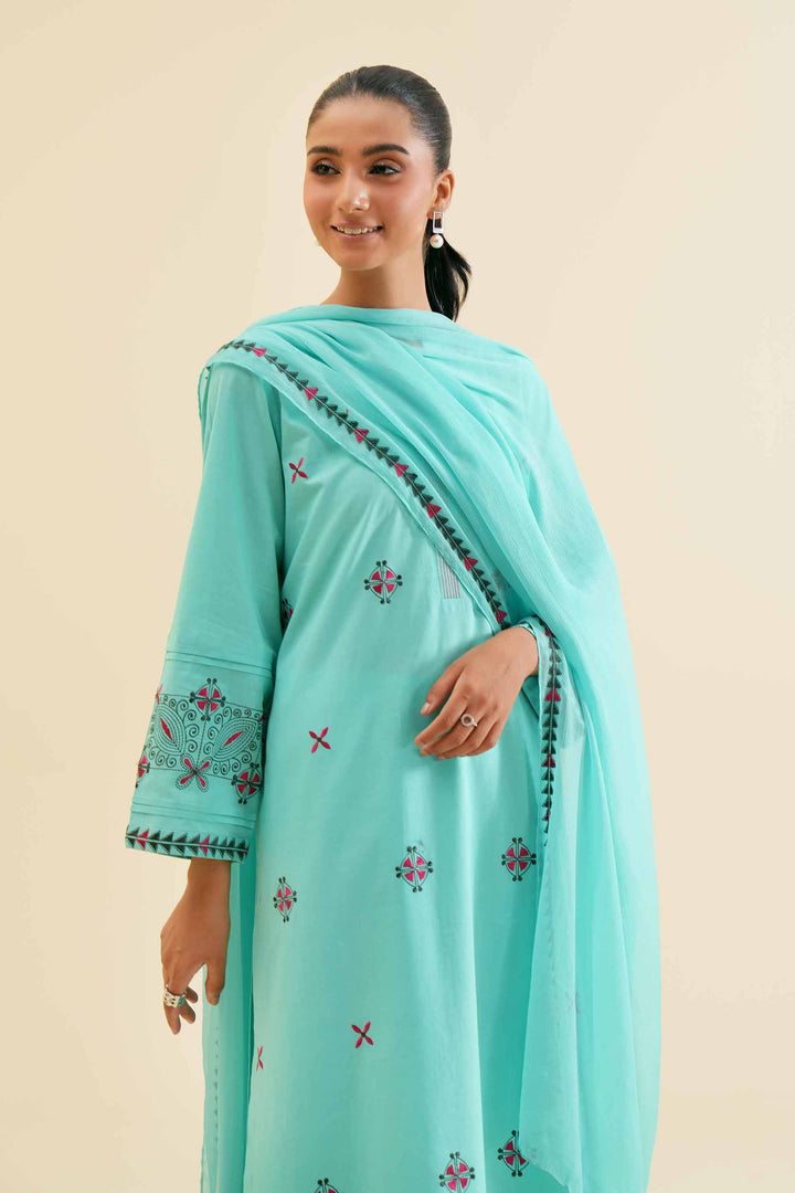 Stylish 3 piece embroidered turquoise cambric shirt with dupatta and trouser