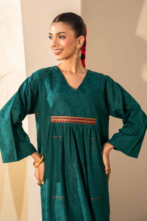 A green kurta suit with an embroidered border, perfect for a stylish and comfortable look.