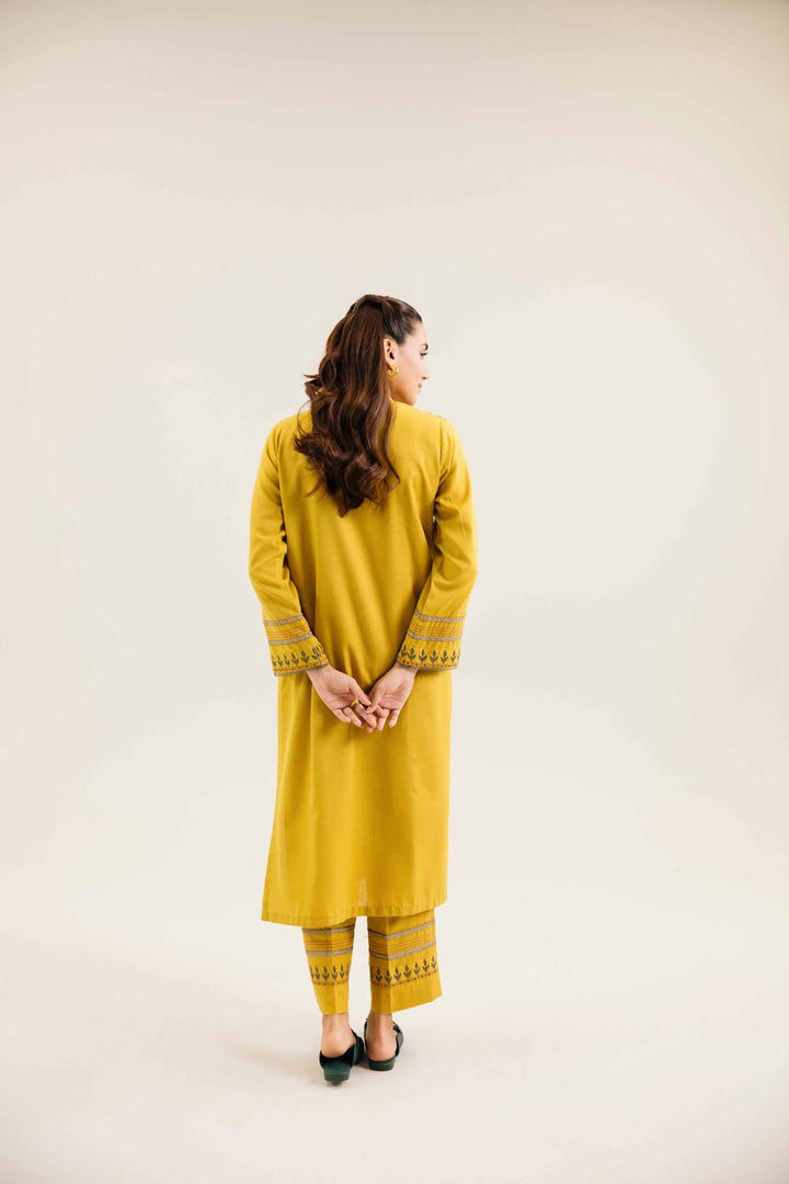 2 Piece Embroidered Saffron Karandi Winter Suit