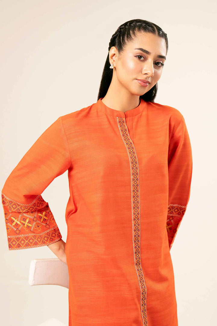 2 Piece Orange Khaddar Printed Suit