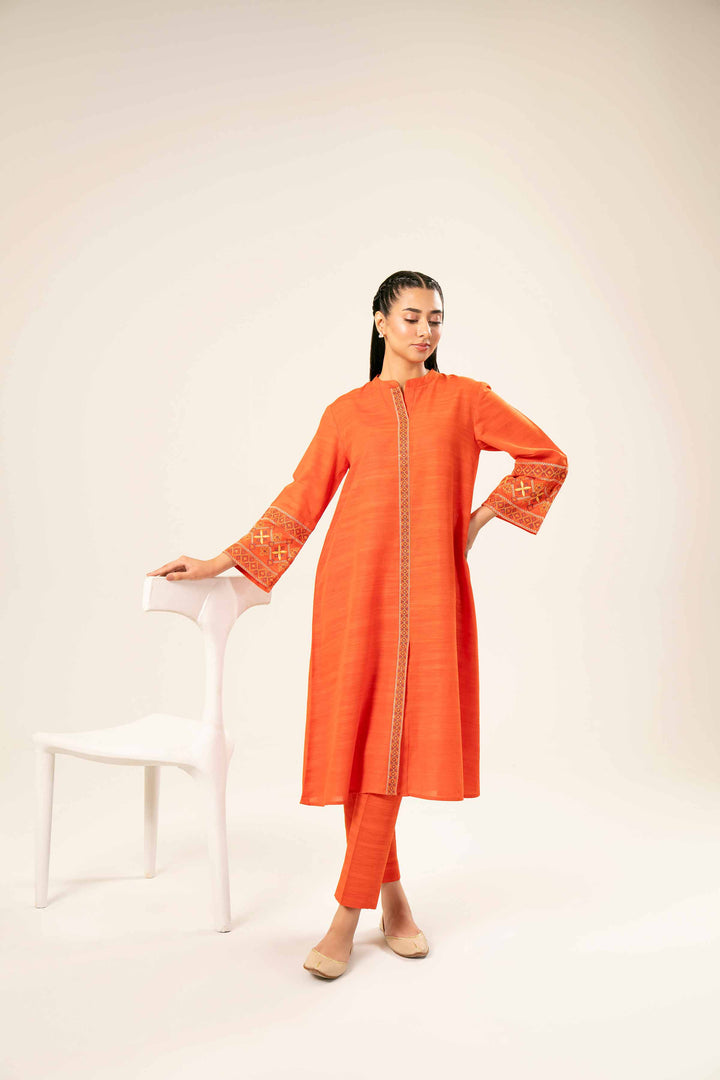 2 Piece Orange Khaddar Printed Suit