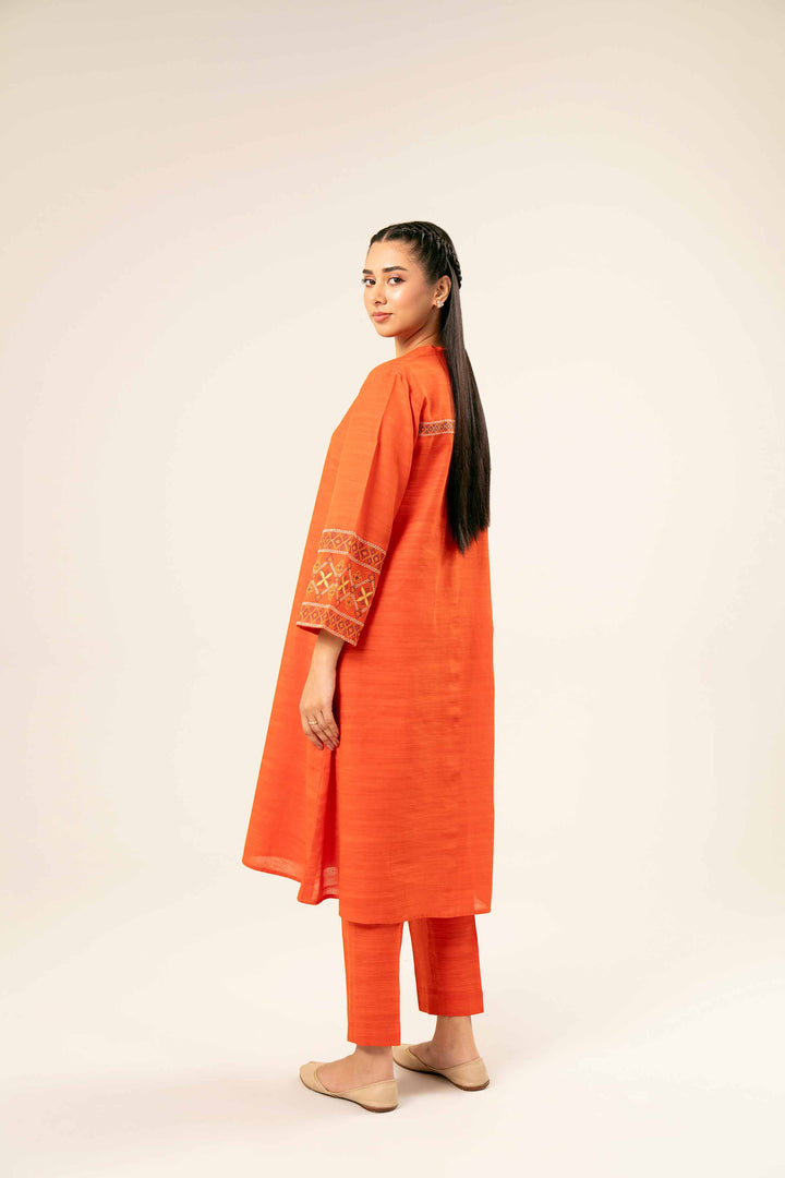 2 Piece Orange Khaddar Printed Suit