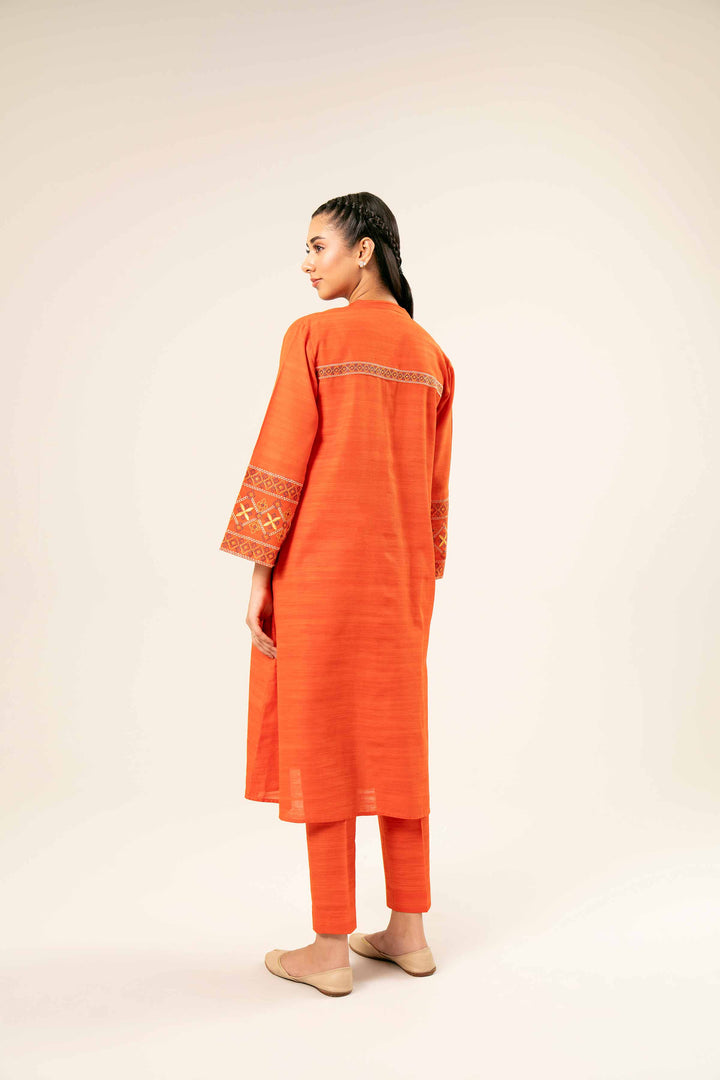 2 Piece Orange Khaddar Printed Suit