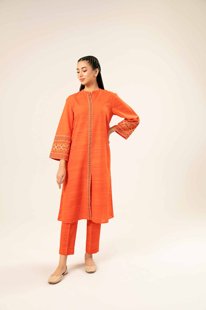 2 Piece Orange Khaddar Printed Suit