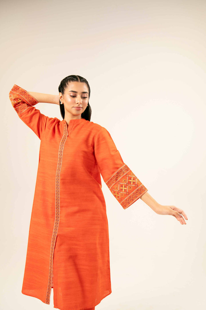 2 Piece Orange Khaddar Printed Suit