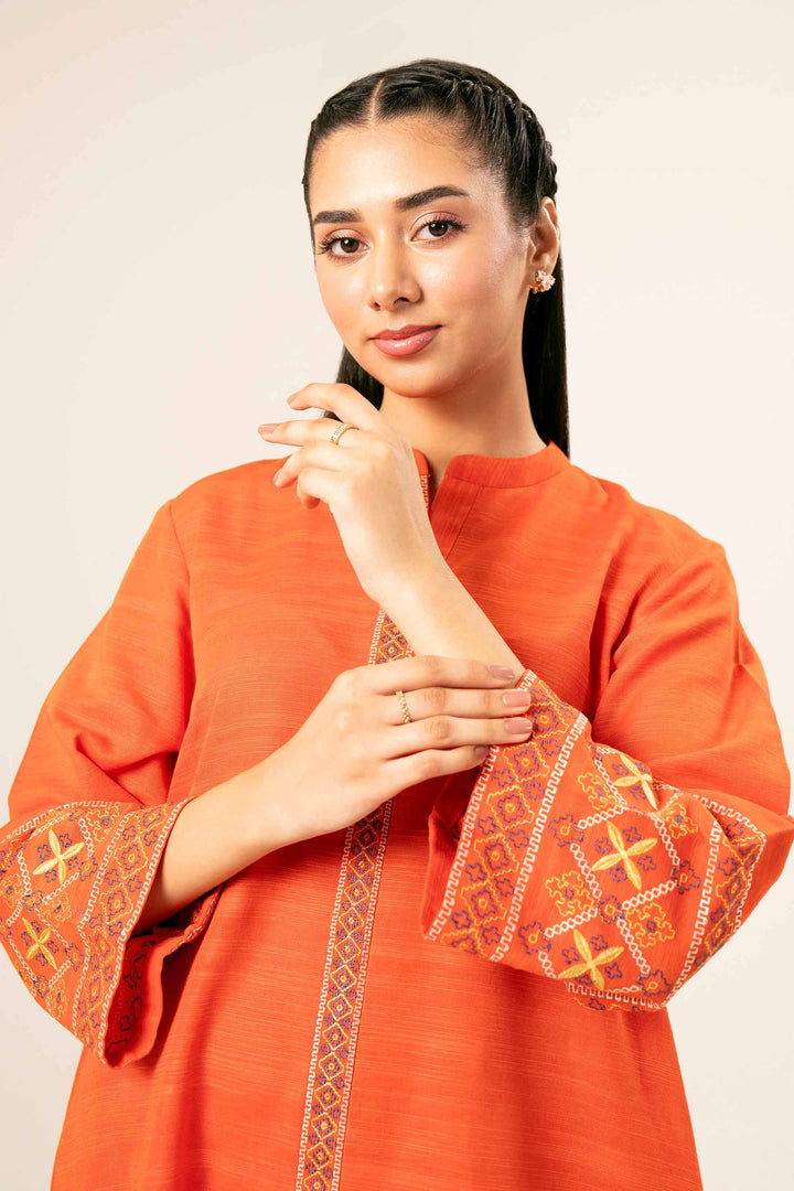 2 Piece Orange Khaddar Printed Suit