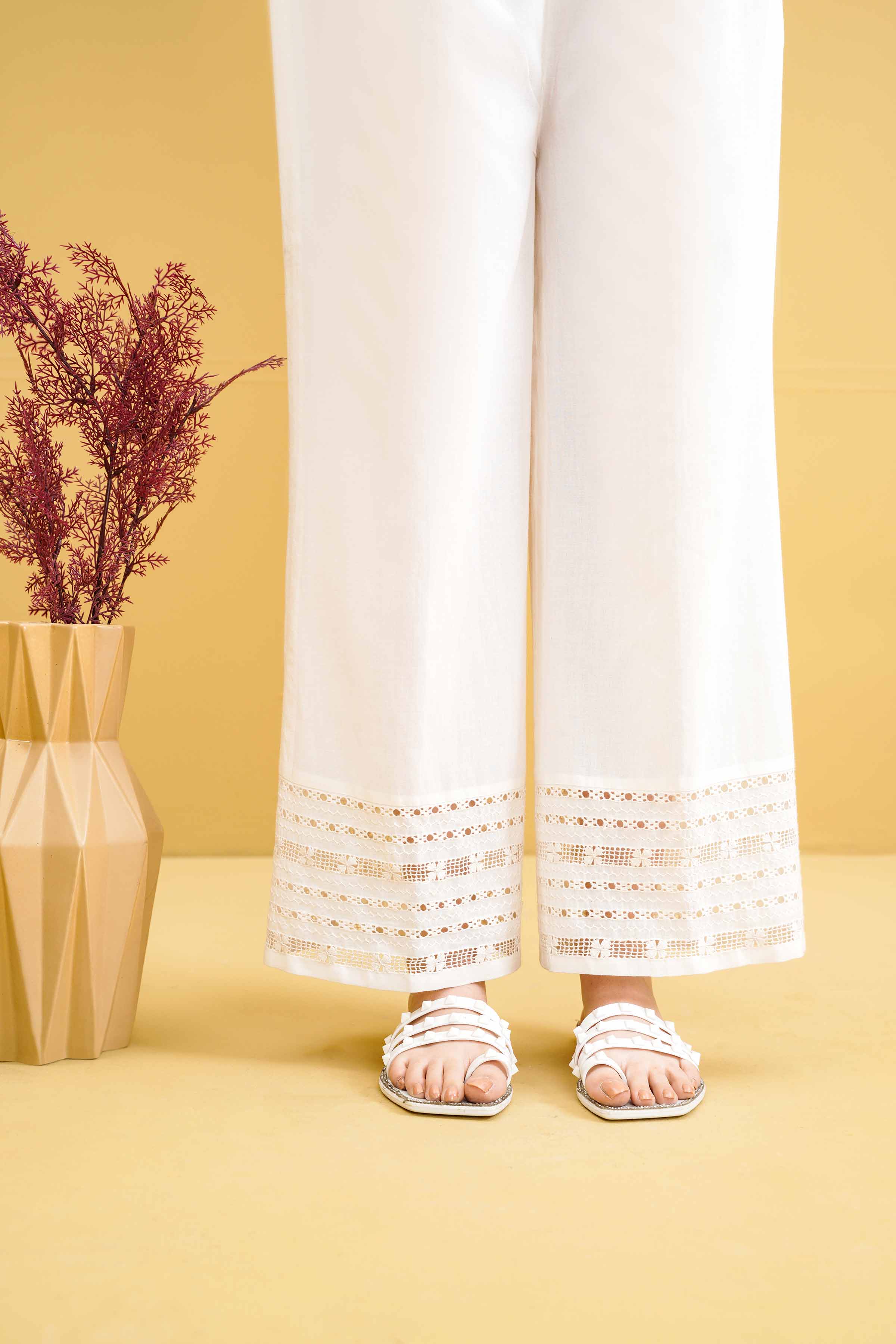 Nishat Linen  You can pair these stitched trousers with  Facebook